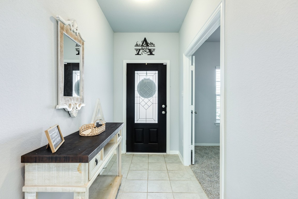 3640 Crosspointe Pass Angleton, TX 77515 - Photo 2 of 21 a bathroom with a sink and a mirror