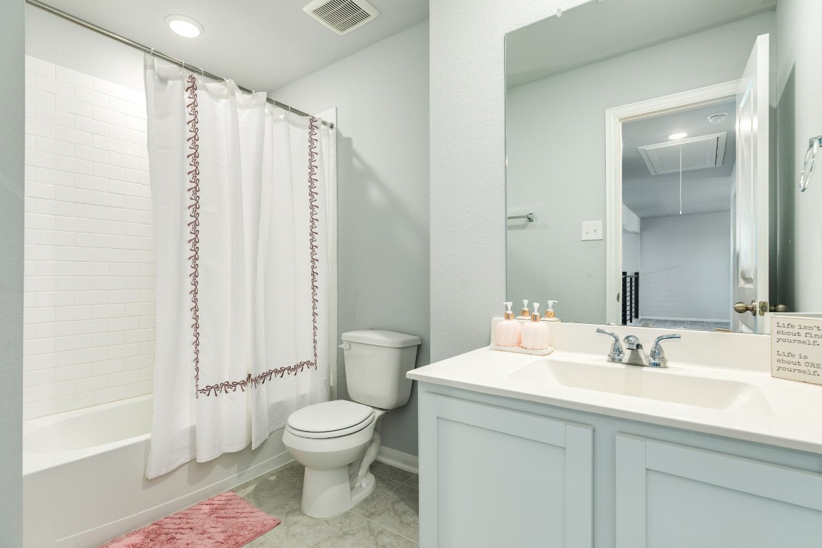 3640 Crosspointe Pass Angleton, TX 77515 - Photo 9 of 21 a bathroom with a sink toilet and shower