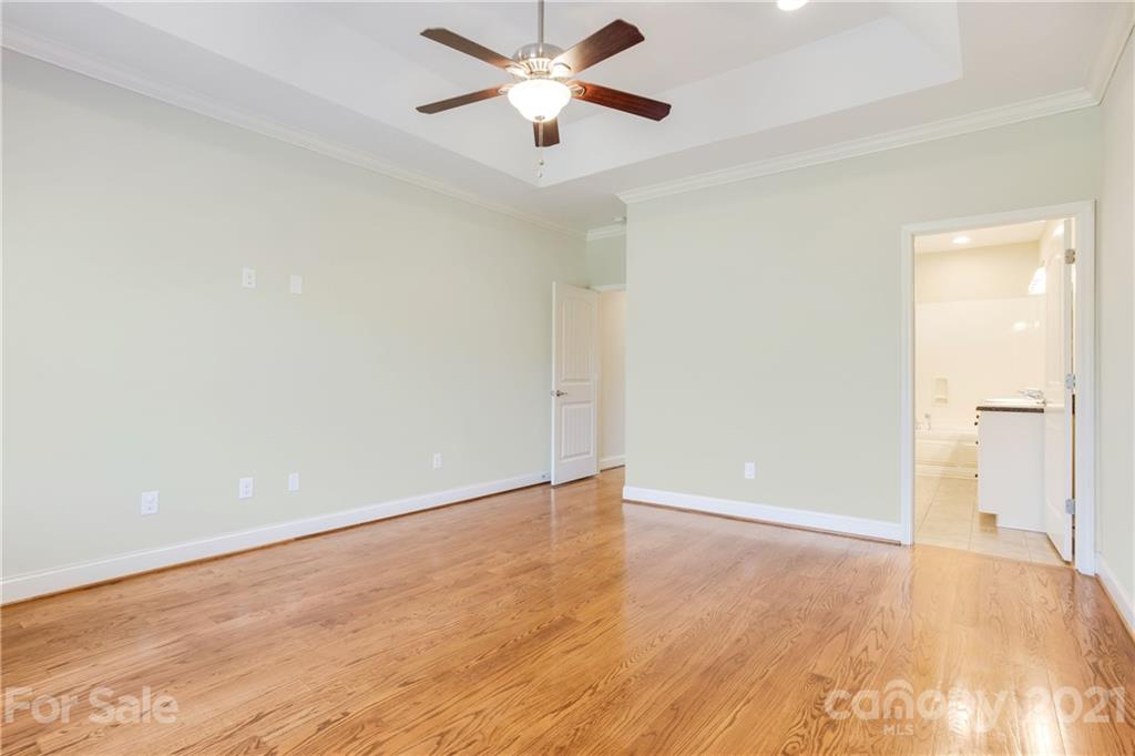 295 Brians Way Rutherfordton, NC 28139 - Photo 18 of 38 an empty room with closet and a chandelier fan
