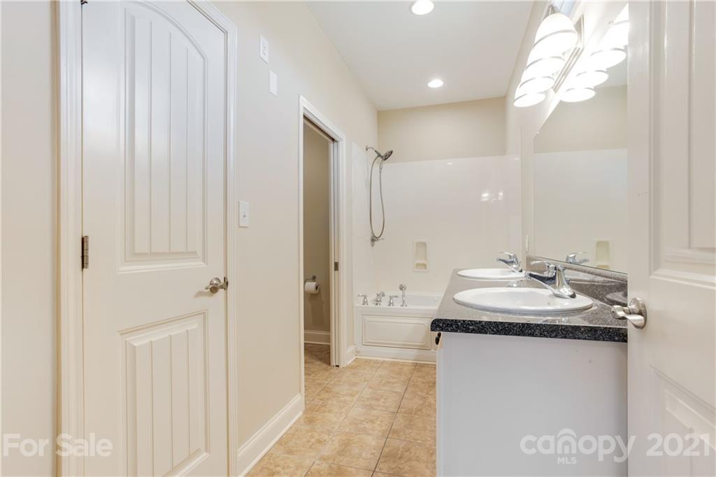 295 Brians Way Rutherfordton, NC 28139 - Photo 19 of 38 a bathroom with a sink and a mirror