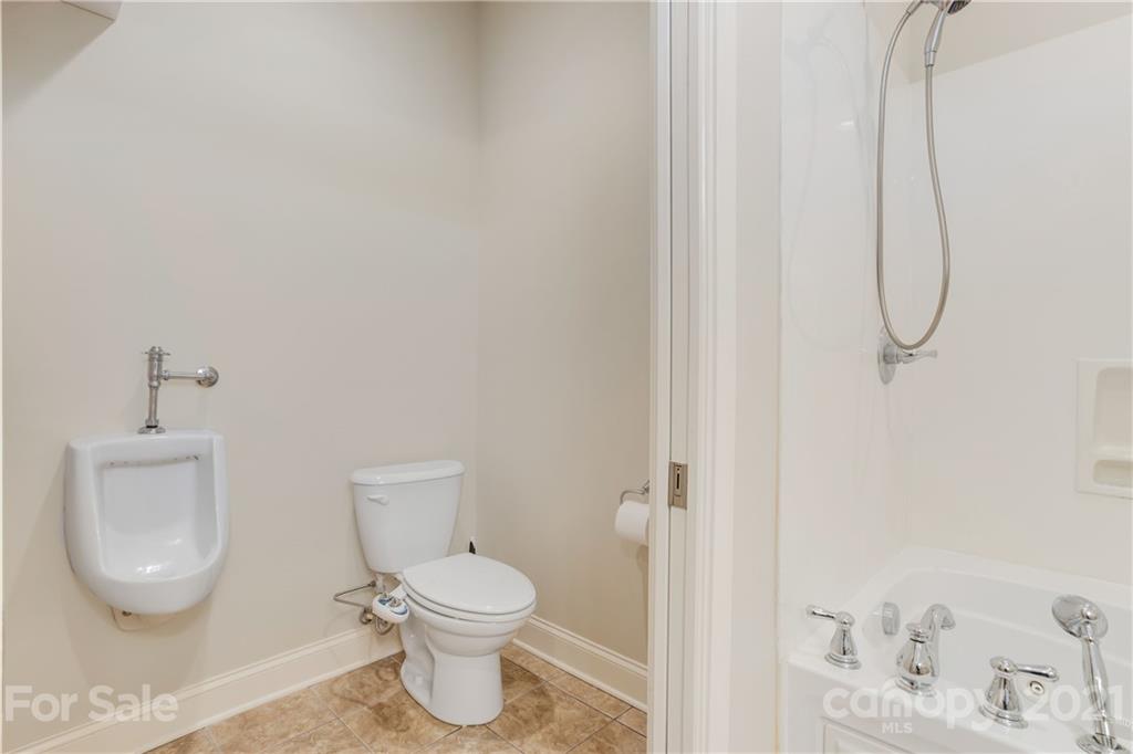 295 Brians Way Rutherfordton, NC 28139 - Photo 20 of 38 a bathroom with a toilet and a shower curtain