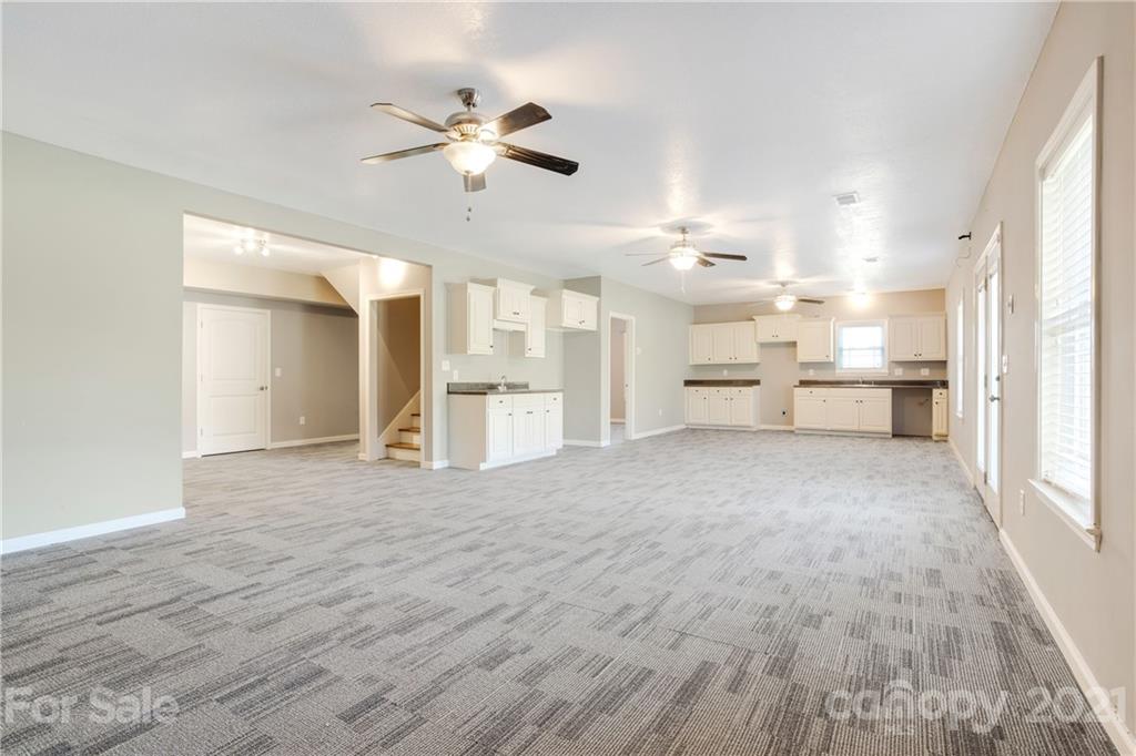 295 Brians Way Rutherfordton, NC 28139 - Photo 22 of 38 a view of a kitchen with a sink and a refrigerator