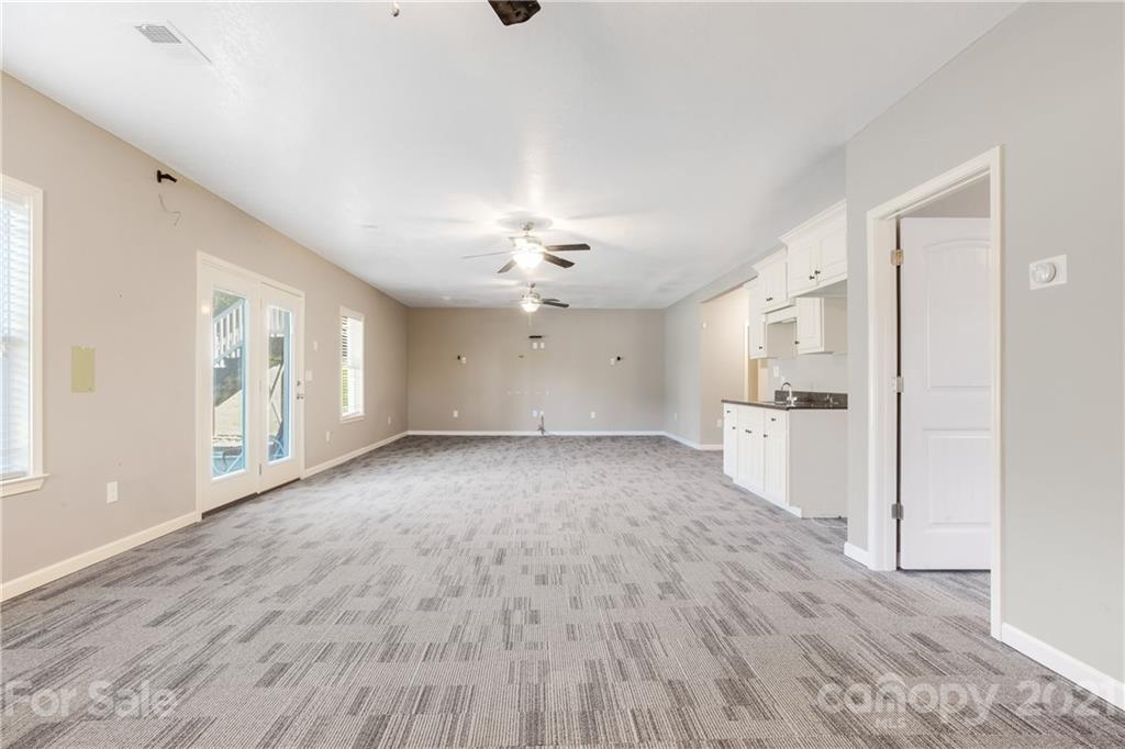 295 Brians Way Rutherfordton, NC 28139 - Photo 24 of 38 a view of a kitchen with wooden floor and a kitchen space