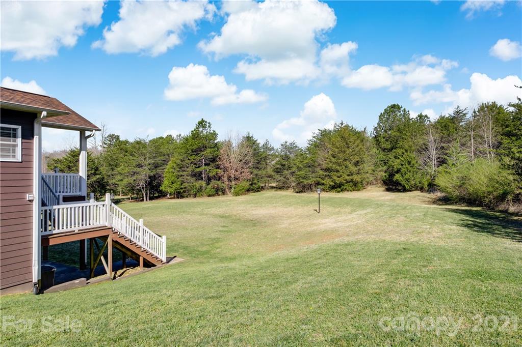 295 Brians Way Rutherfordton, NC 28139 - Photo 31 of 38 a view of a house with a yard