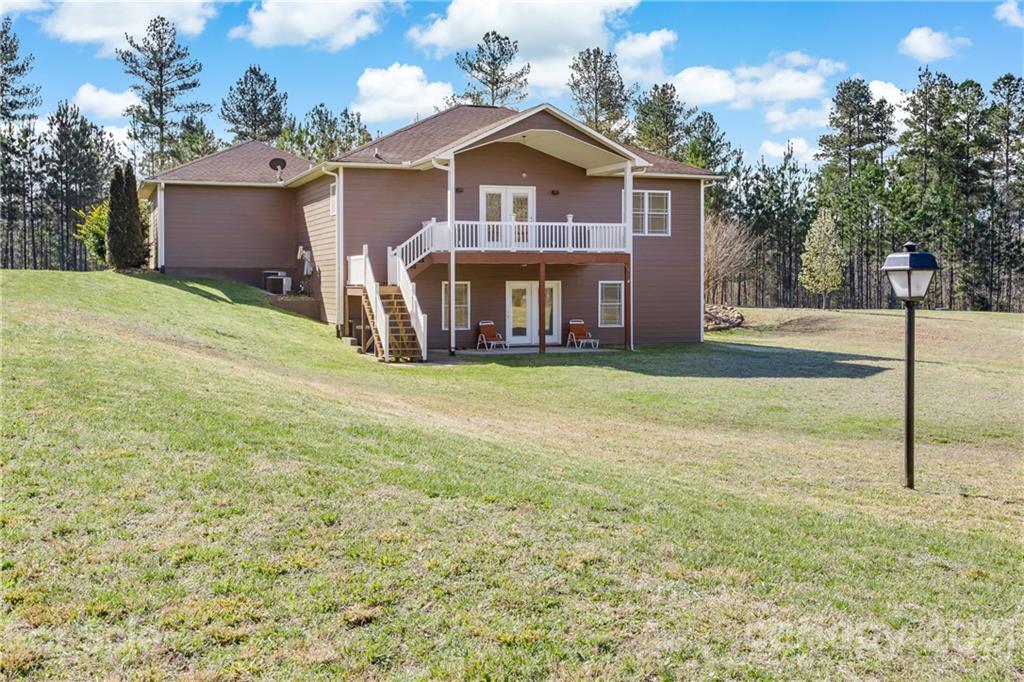 295 Brians Way Rutherfordton, NC 28139 - Photo 33 of 38 a view of a yard in front of a house with large trees