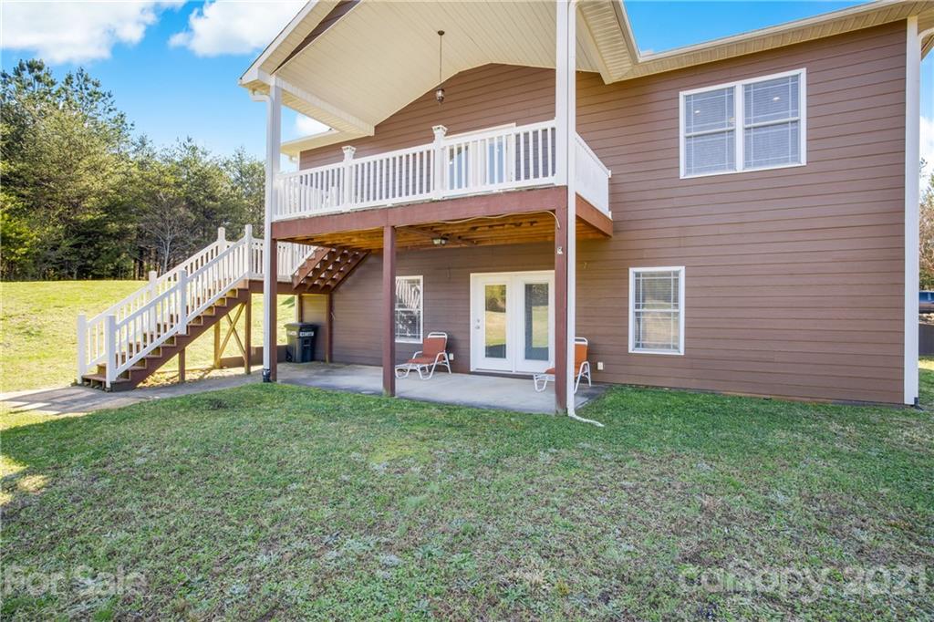295 Brians Way Rutherfordton, NC 28139 - Photo 34 of 38 a view of a house with a yard and a porch