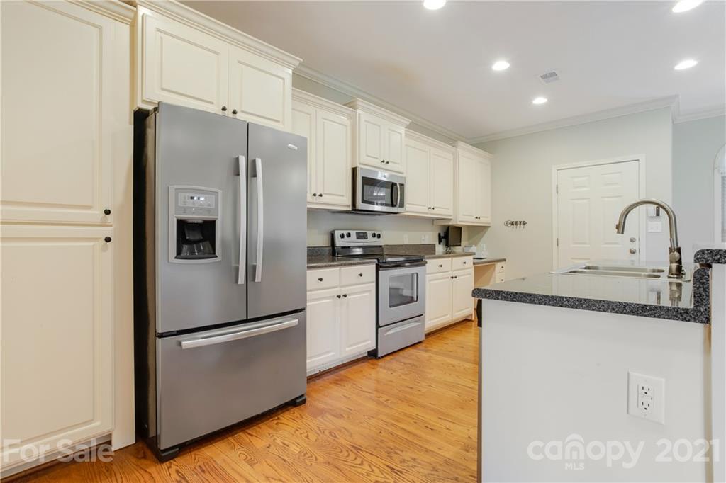 295 Brians Way Rutherfordton, NC 28139 - Photo 6 of 38 a kitchen with stainless steel appliances a refrigerator sink and microwave