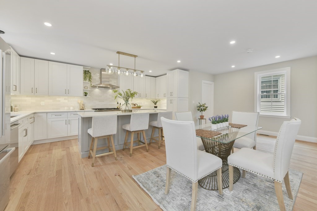 25 Locust Street, Unit 1 Winthrop, MA 02152 - Photo 11 of 38 a view of a dining room with furniture and wooden floor