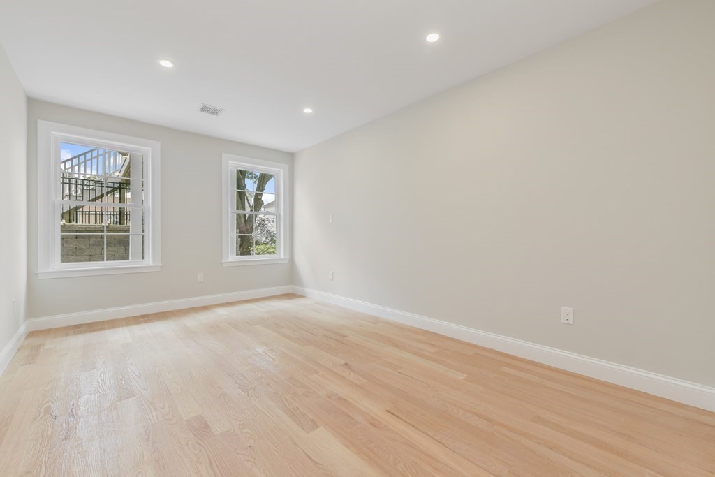 25 Locust Street, Unit 1 Winthrop, MA 02152 - Photo 19 of 38 a view of an empty room with a window
