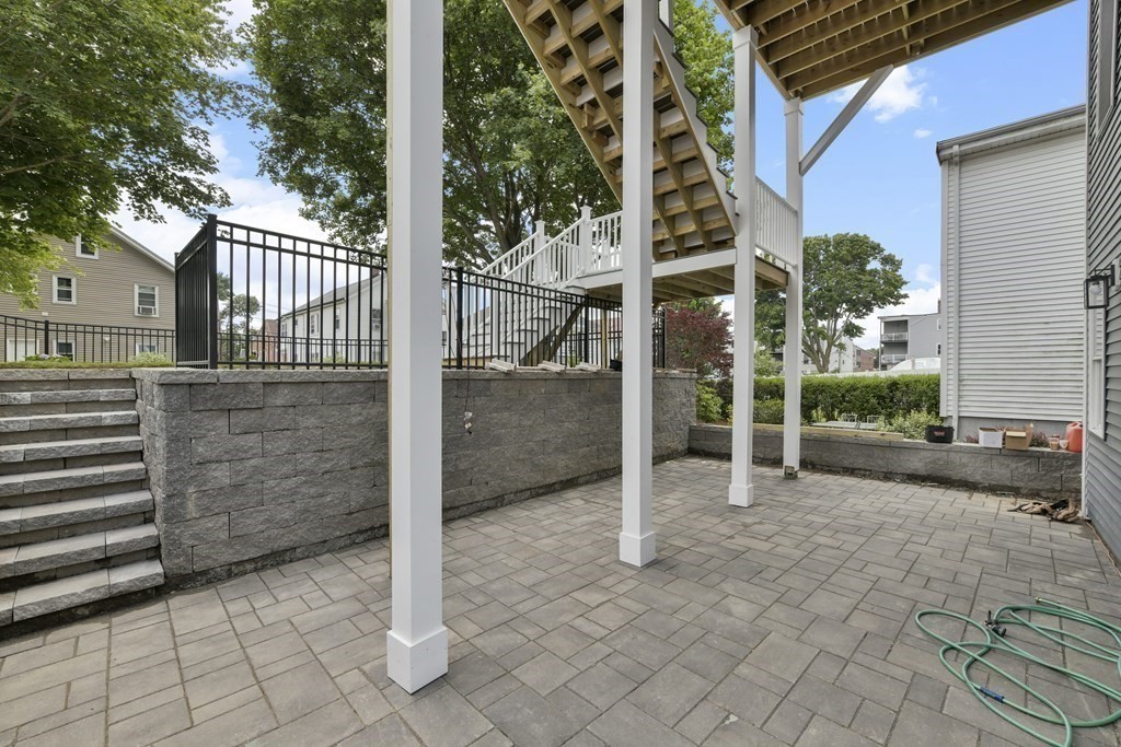 25 Locust Street, Unit 1 Winthrop, MA 02152 - Photo 23 of 38 a view of a entrance gate of the house