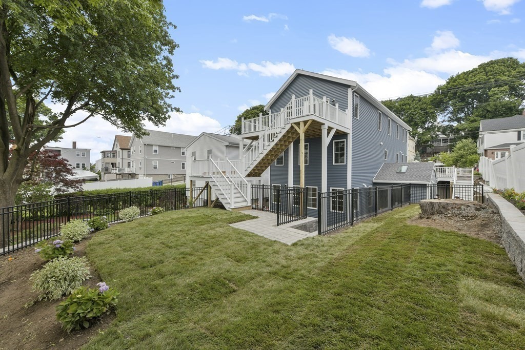 25 Locust Street, Unit 1 Winthrop, MA 02152 - Photo 26 of 38 a view of a house with yard and sitting area