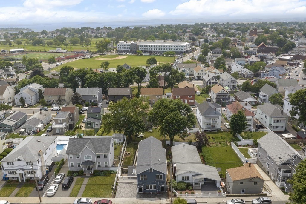 25 Locust Street, Unit 1 Winthrop, MA 02152 - Photo 29 of 38 an aerial view of residential building with outdoor space and lake view
