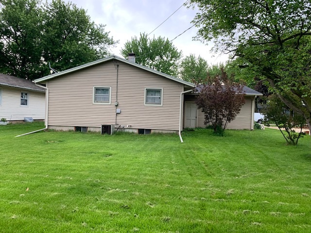 209 Southview Drive Rochelle, IL 61068 - Photo 15 of 16 a view of a backyard with plants and large trees