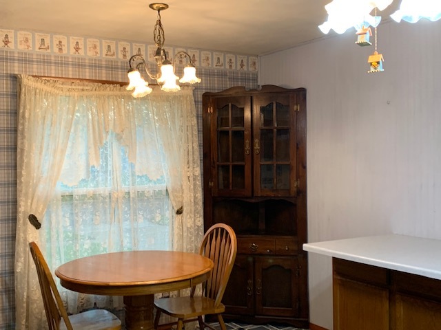 209 Southview Drive Rochelle, IL 61068 - Photo 5 of 16 a dining room with furniture and window