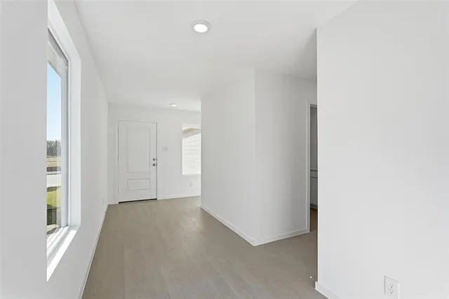 a bathroom with a bathtub a sink and a mirror