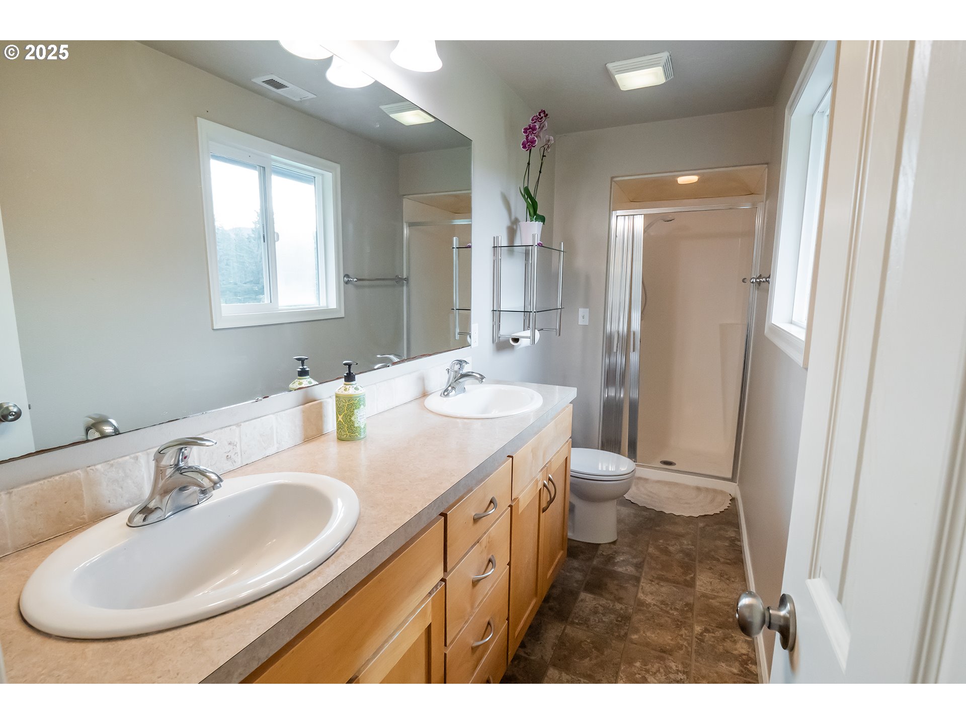 76377 Mosby Creek Road Cottage Grove, OR 97424 - Photo 14 of 48 a bathroom with a sink double vanity granite and a mirror