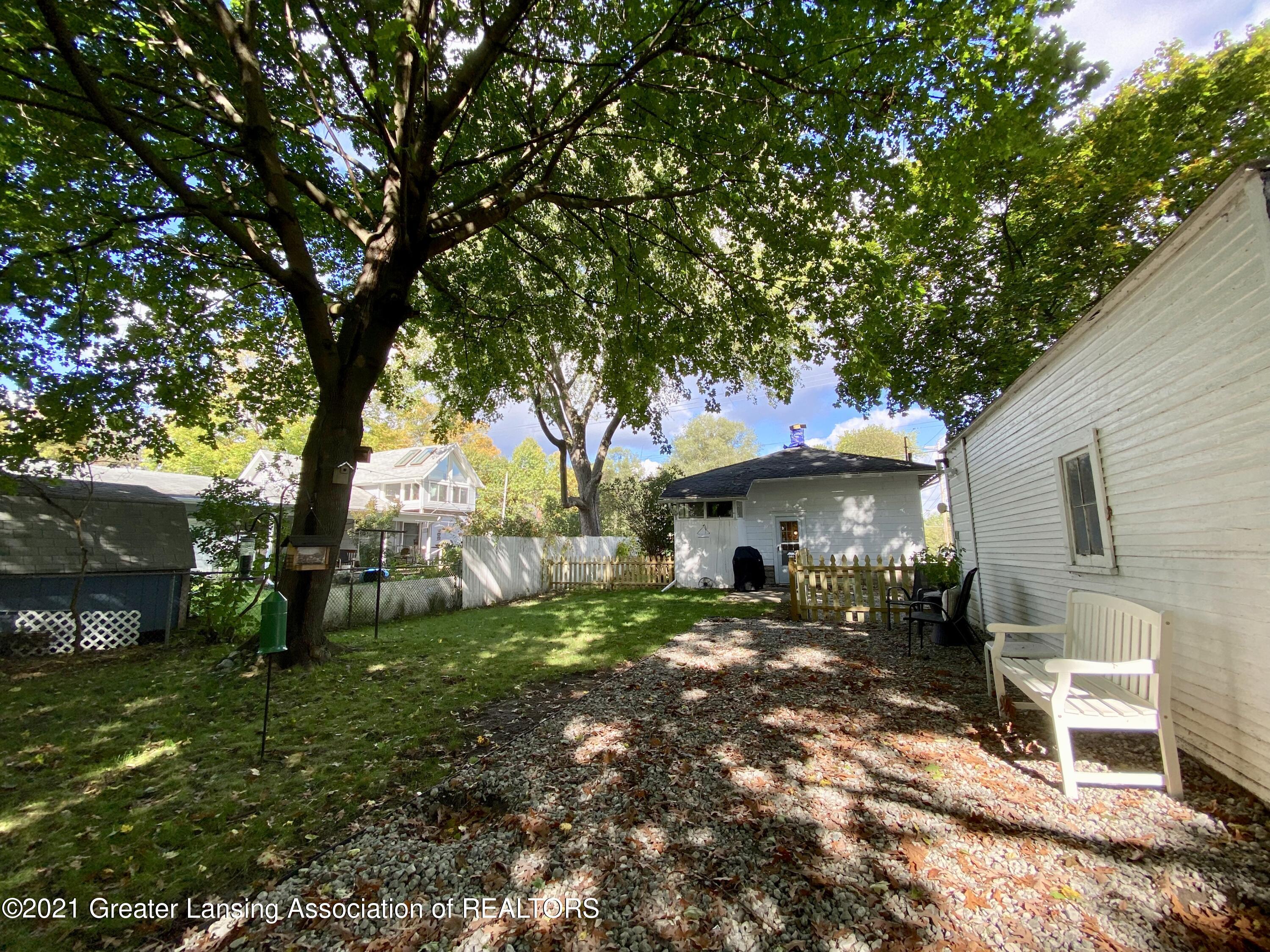 1379 Haslett Road Haslett, MI 48840 - Photo 21 of 22 rear