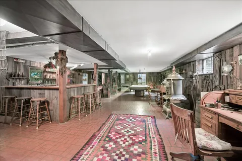 a view of a living room and dining room
