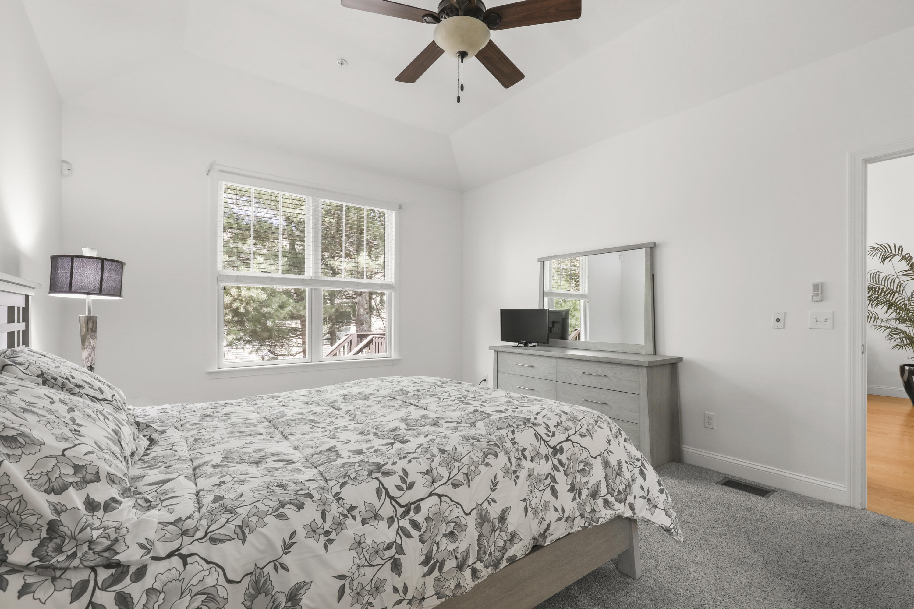 21 Grey Hawk Drive, Unit 21 Mashpee, MA 02649 - Photo 13 of 34 a bedroom with a bed and window