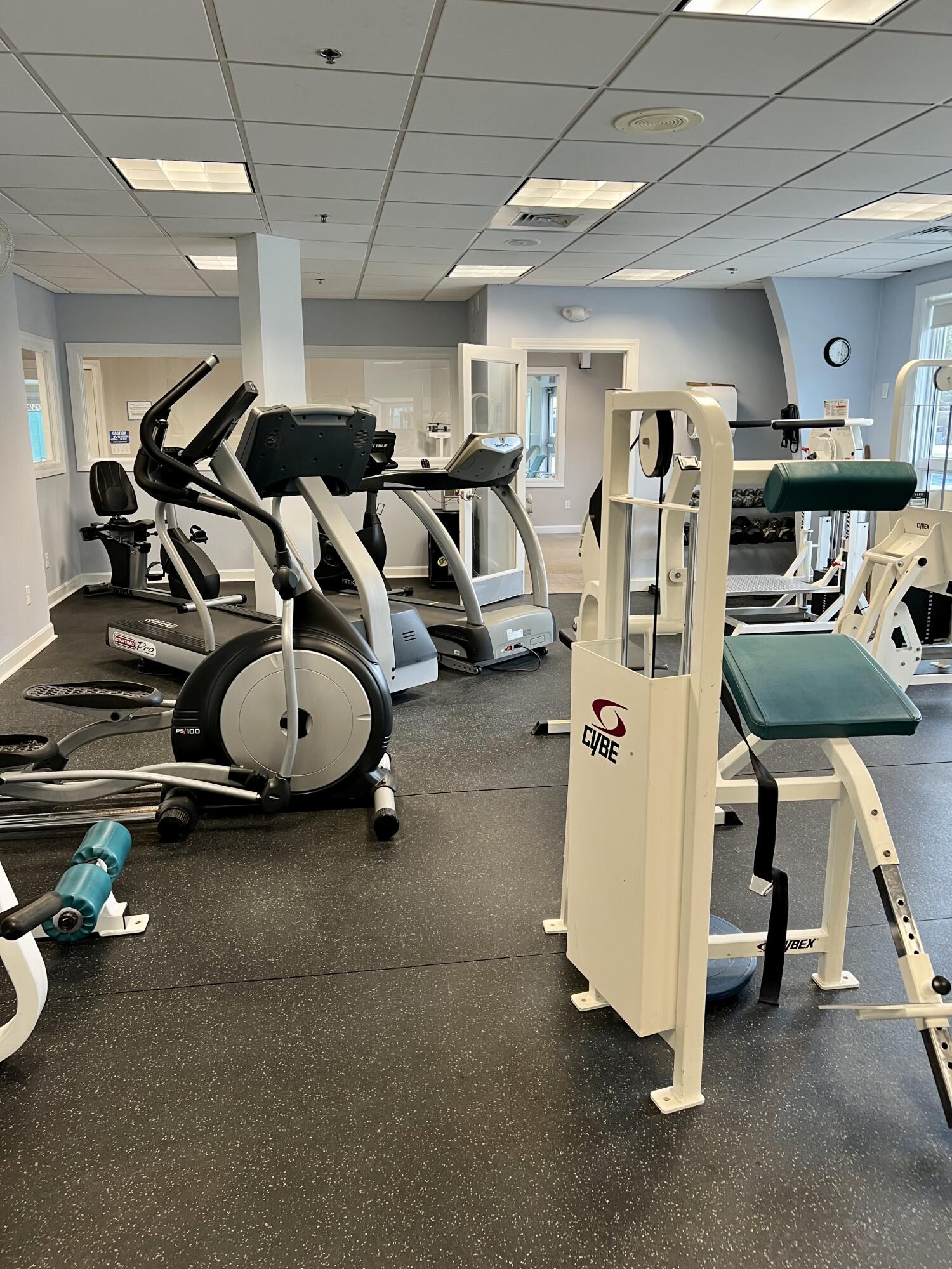 21 Grey Hawk Drive, Unit 21 Mashpee, MA 02649 - Photo 34 of 34 a view of a room with gym equipment