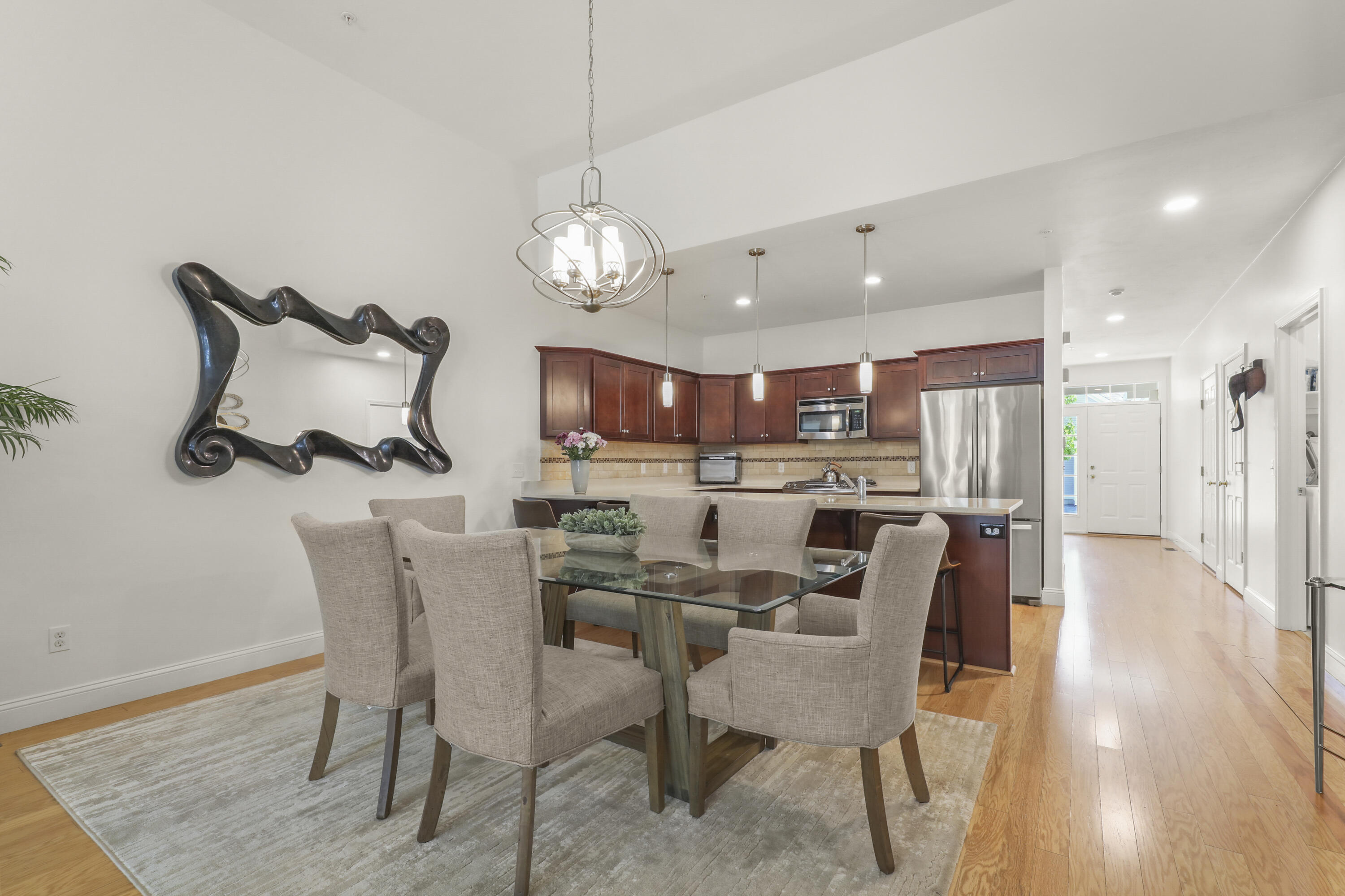 21 Grey Hawk Drive, Unit 21 Mashpee, MA 02649 - Photo 4 of 34 a view of a dining room with furniture
