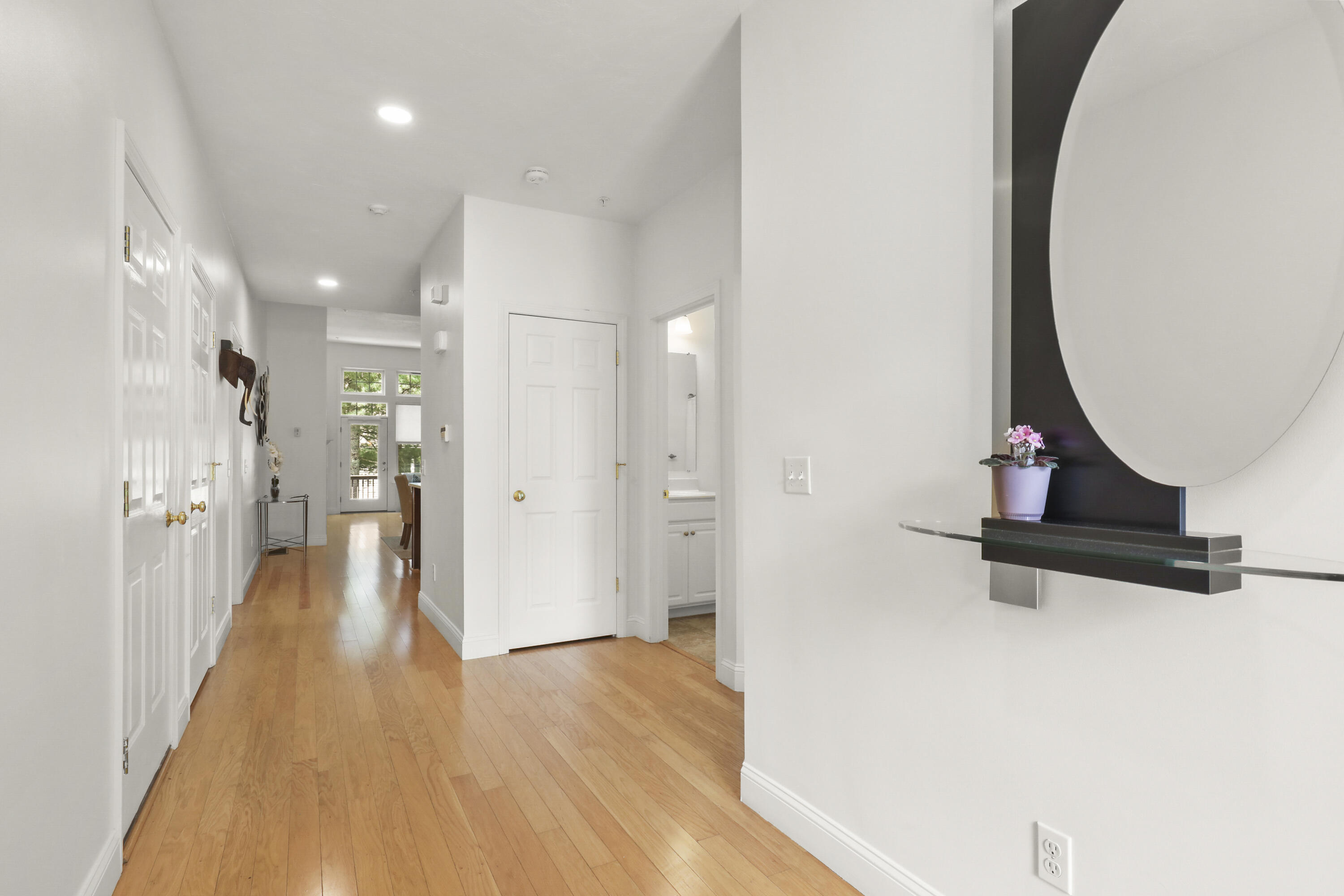 21 Grey Hawk Drive, Unit 21 Mashpee, MA 02649 - Photo 9 of 34 wooden floor in a gallery