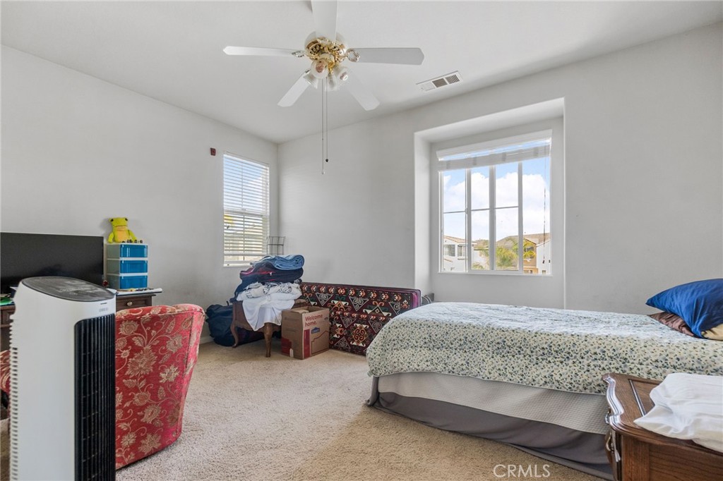 6136 Walnut Grove Court Rancho Cucamonga, CA 91739 - Photo 29 of 41 a bedroom with 2 bed and a window
