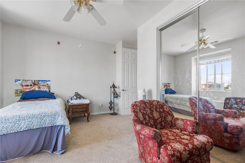 6136 Walnut Grove Court Rancho Cucamonga, CA 91739 - Photo 30 of 41 a bedroom with bed and window