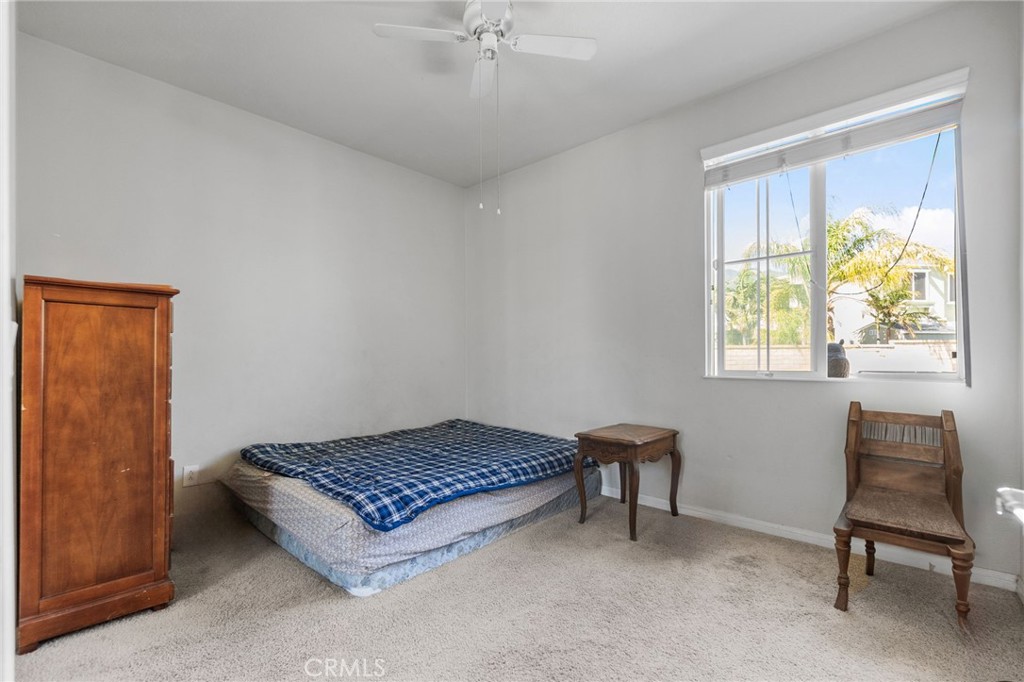 6136 Walnut Grove Court Rancho Cucamonga, CA 91739 - Photo 31 of 41 a living room with furniture and a window