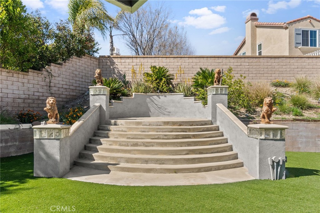6136 Walnut Grove Court Rancho Cucamonga, CA 91739 - Photo 36 of 41 a view of a yard with plants