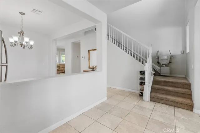 a view of entryway and hall with a window