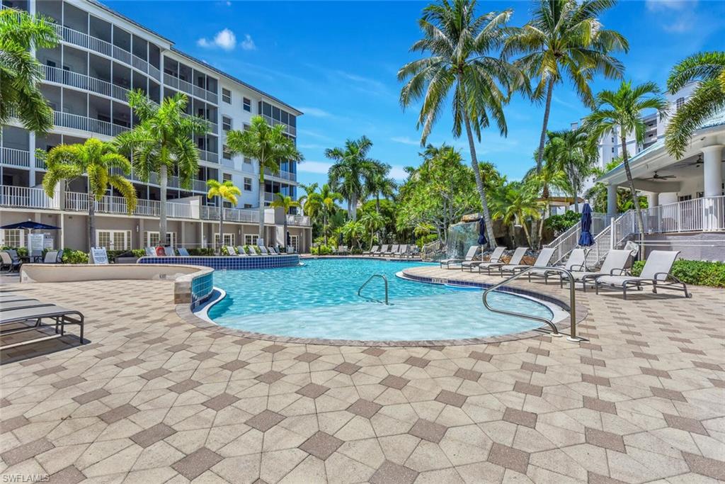 450 Launch Circle, Unit 602 Naples, FL 34108 - Photo 25 of 27 a view of a swimming pool with a patio