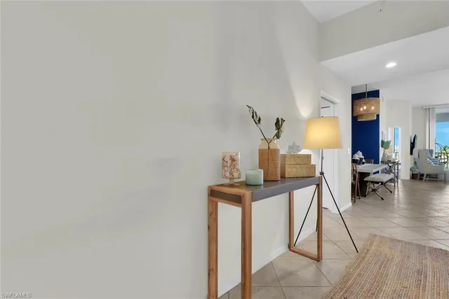 a view of a workspace with furniture and wooden floor