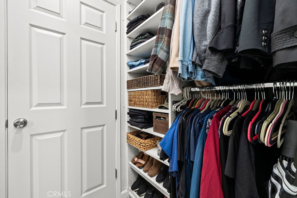 5050 Linden Avenue, Unit 62 Long Beach, CA 90805 - Photo 17 of 37 a view of walk in closet with clothes and shoes