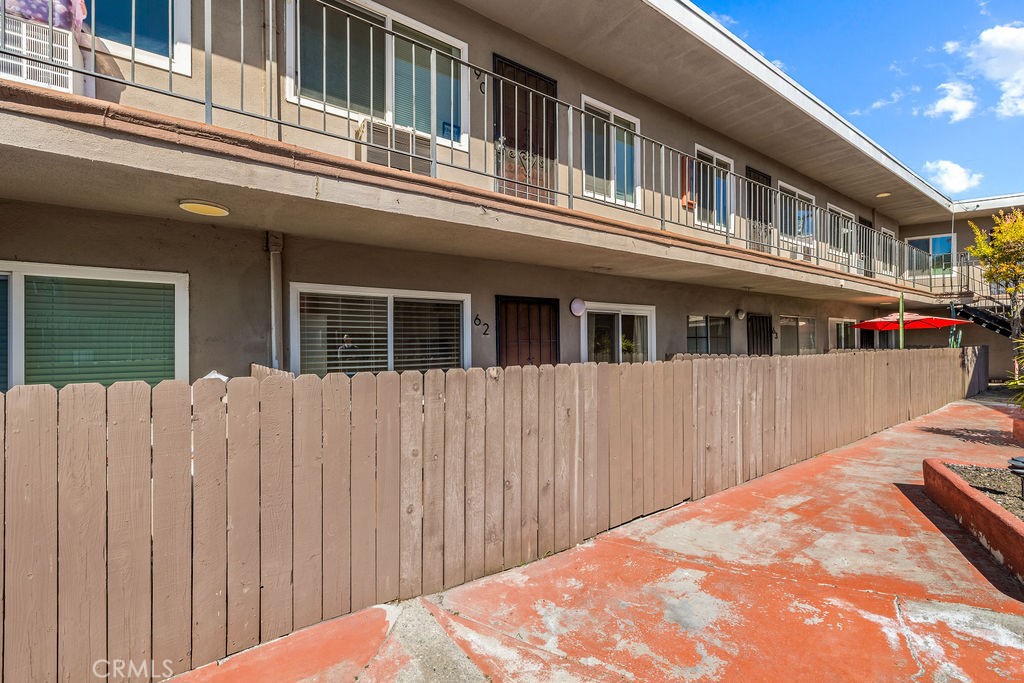 5050 Linden Avenue, Unit 62 Long Beach, CA 90805 - Photo 22 of 37 a balcony view with a large window and balcony