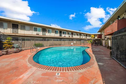 a view of a house with swimming pool