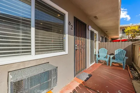 a balcony view with a outdoor seating space