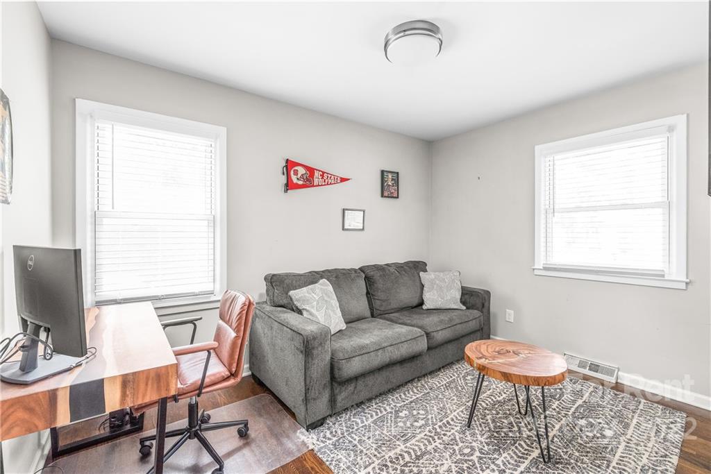 3932 Slagle Drive Charlotte, NC 28215 - Photo 16 of 26 a living room with furniture and a window