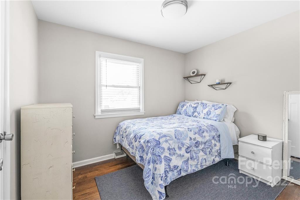 3932 Slagle Drive Charlotte, NC 28215 - Photo 18 of 26 a bedroom with a bed and a window