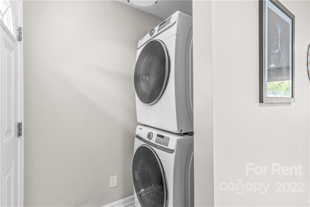 3932 Slagle Drive Charlotte, NC 28215 - Photo 19 of 26 a utility room with dryer and washer