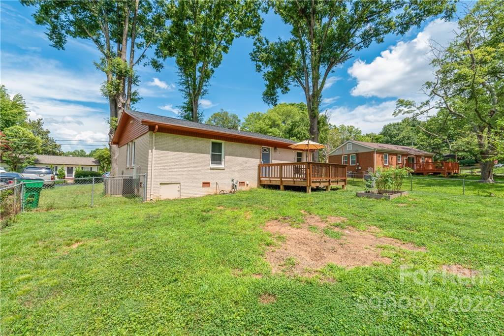 3932 Slagle Drive Charlotte, NC 28215 - Photo 25 of 26 a view of a house with backyard and garden