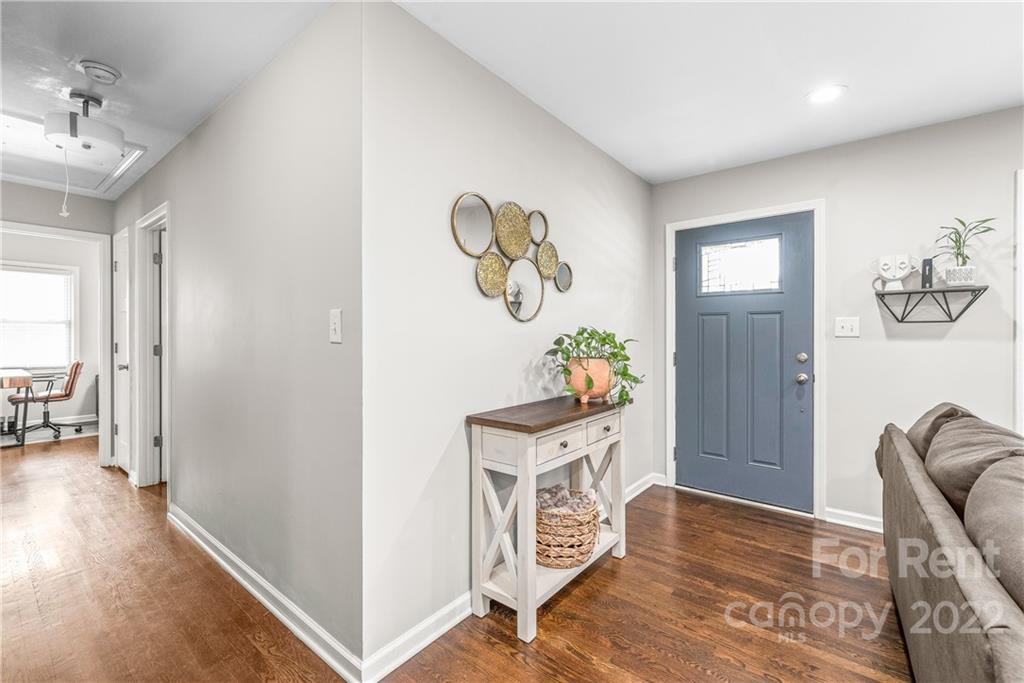 3932 Slagle Drive Charlotte, NC 28215 - Photo 8 of 26 a view of livingroom with furniture and wooden floor