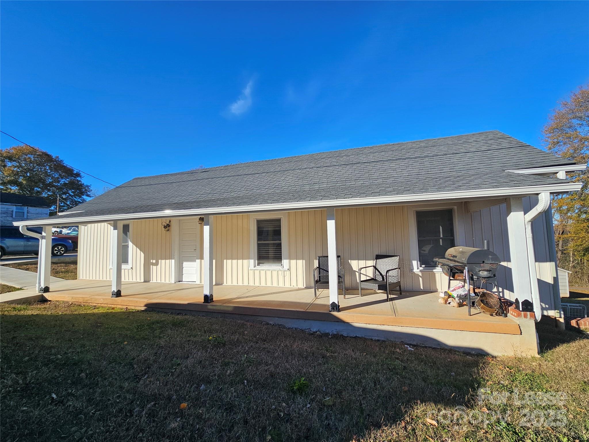 208 West Main Street Lawndale, NC 28090 - Photo 2 of 15 a view of a house with backyard porch and sitting area