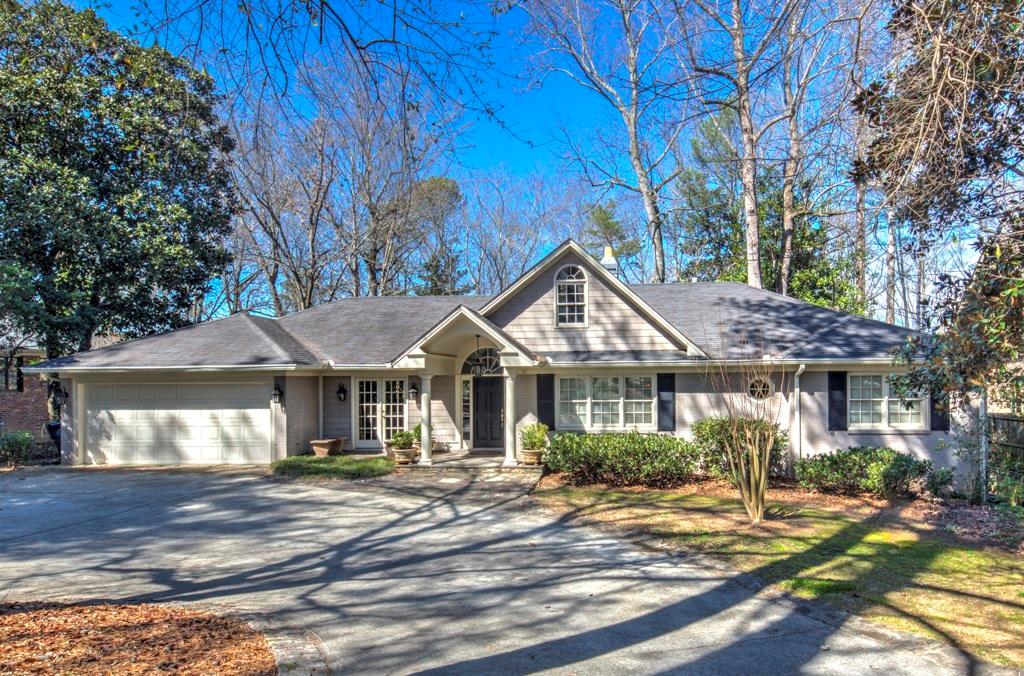 3054 Arden Road Northwest Atlanta, GA 30305 - Photo 1 of 1 a front view of a house with a yard
