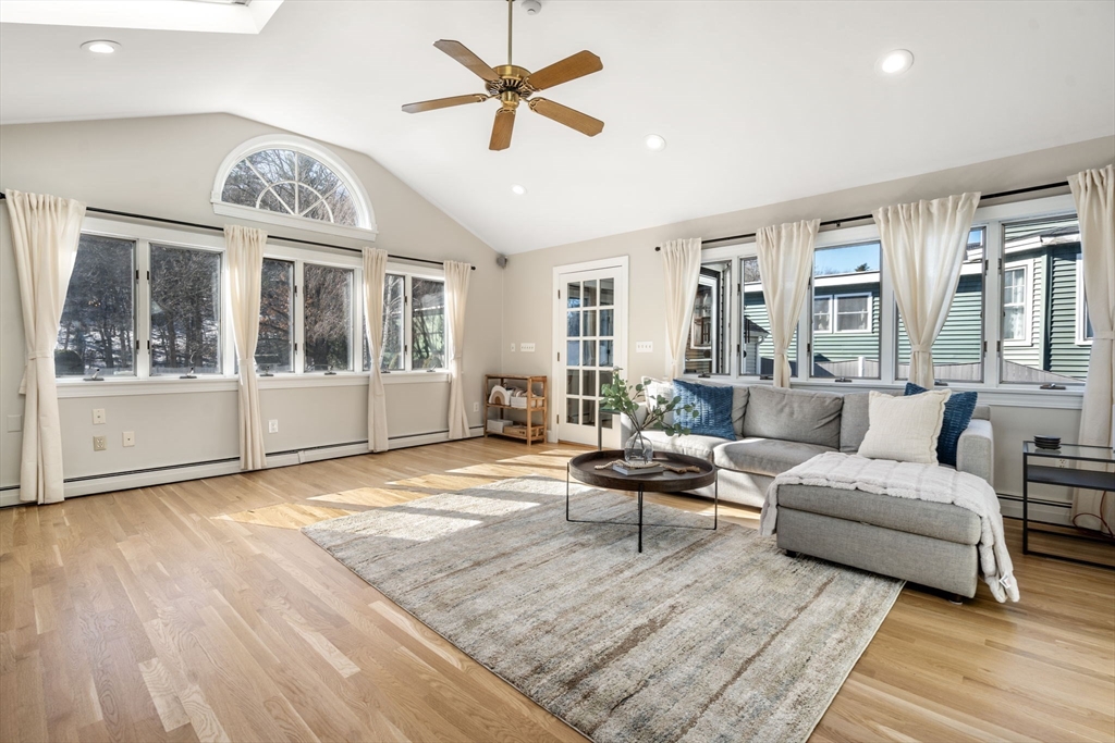 48 Spring Street Wakefield, MA 01880 - Photo 12 of 28 a living room with furniture a window and wooden floor