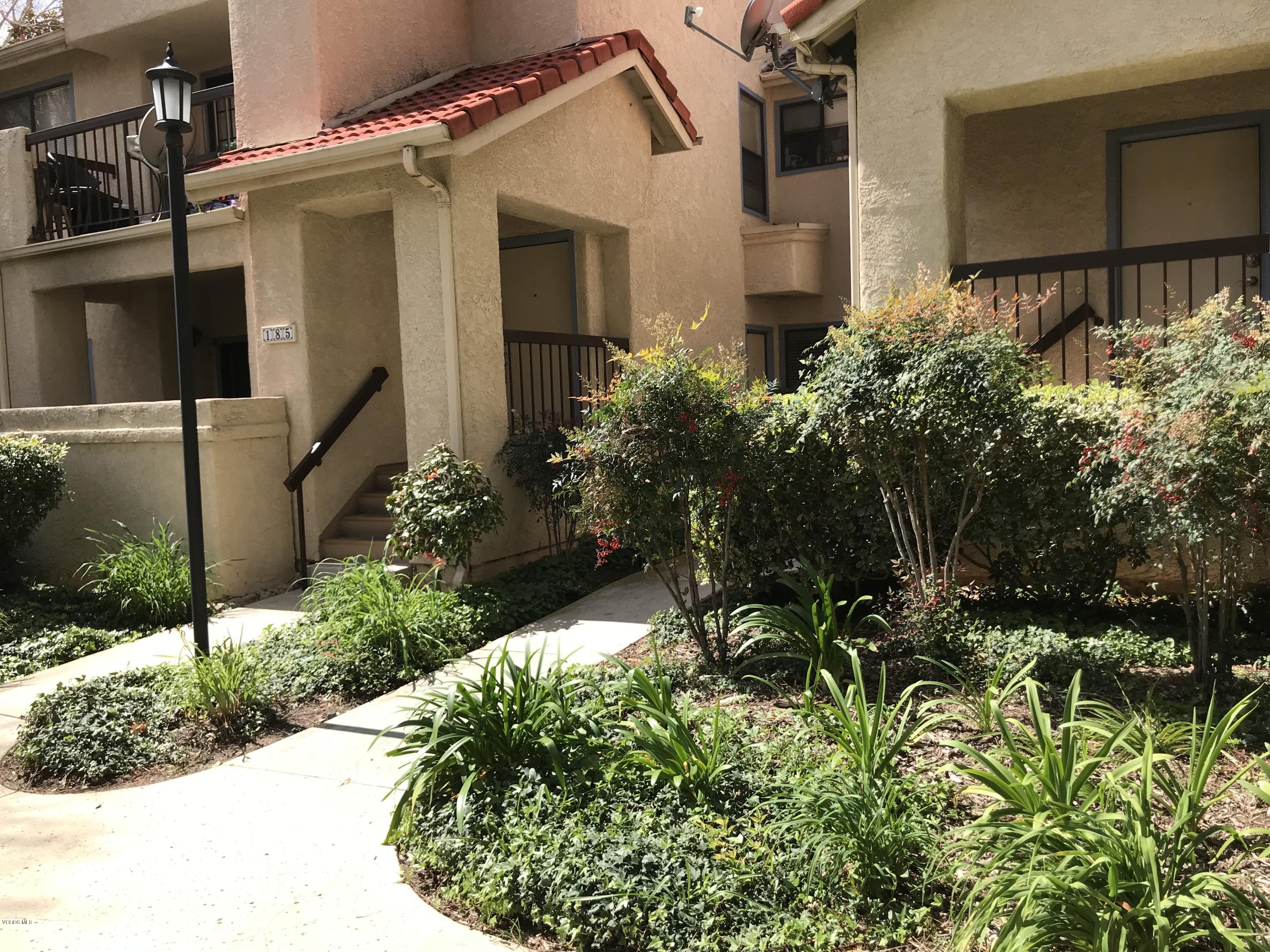 front view of a house with a small yard