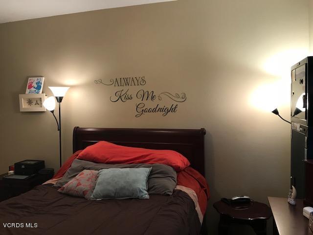 2381 Archwood Lane, Unit 184 Simi Valley, CA 93063 - Photo 11 of 33 a bedroom with a bed and a window