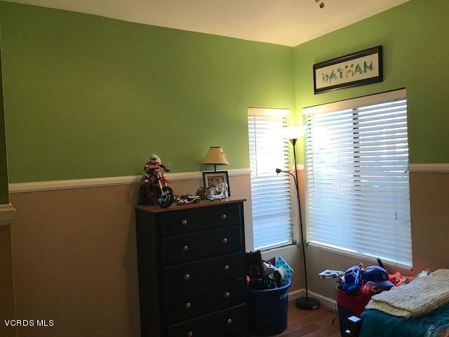 2381 Archwood Lane, Unit 184 Simi Valley, CA 93063 - Photo 16 of 33 a bedroom with a bed and a window