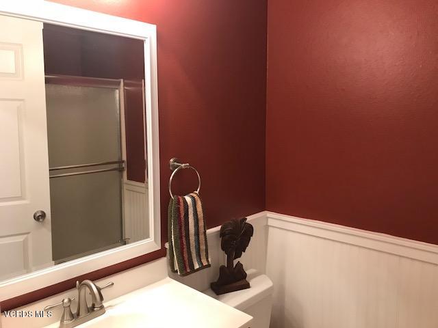 2381 Archwood Lane, Unit 184 Simi Valley, CA 93063 - Photo 18 of 33 a bathroom with a sink and a mirror