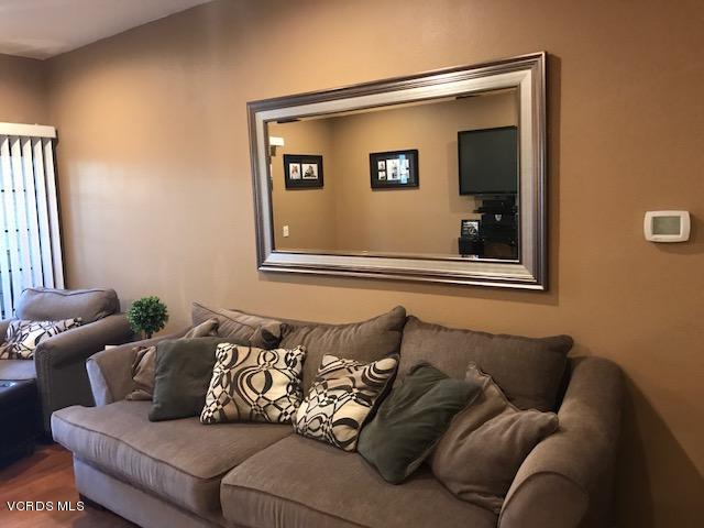 2381 Archwood Lane, Unit 184 Simi Valley, CA 93063 - Photo 3 of 33 a living room with furniture and a window